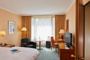 Postel nebo postele na pokoji v ubytování co56 Hotel Chemnitz