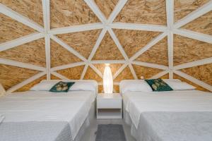 Postel nebo postele na pokoji v ubytování Planetarium