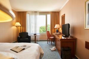 Postel nebo postele na pokoji v ubytování co56 Hotel Chemnitz