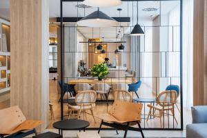 a dining room with a table and chairs at Golden Hotel Barcelona in Barcelona +38 photos