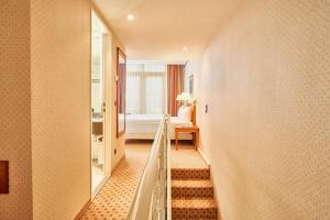 Postel nebo postele na pokoji v ubytování co56 Hotel Chemnitz