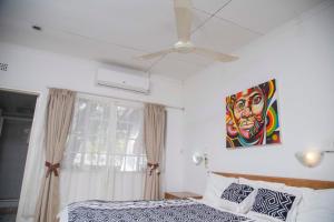 Voodi või voodid majutusasutuse The Ad Lib Executive lodge toas
