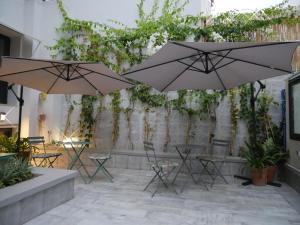 Patio nebo venkovní prostory v ubytování Gardenia Boutique Hotel
