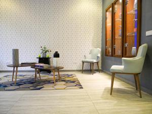 Posezení v ubytování Gardenia Boutique Hotel
