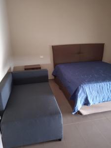 A bed or beds in a room at Le Zagare b&b