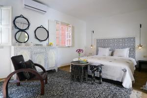 Postel nebo postele na pokoji v ubytování Riad Le Limoun and Spa + 37 fotografií