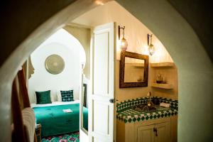 Kuchyň nebo kuchyňský kout v ubytování Riad Le Limoun and Spa