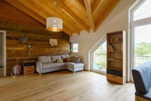 Posezení v ubytování Ferienwohnung Schreierhof Bio Bauernhof