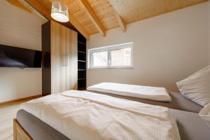 Postel nebo postele na pokoji v ubytování Ferienwohnung Schreierhof Bio Bauernhof