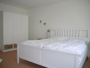 Een bed of bedden in een kamer bij Lichtblick-Hanseatic