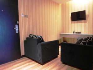 Sjónvarps- og/eða afþreyingartæki á Mandarin Hotel Kota Kinabalu