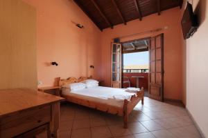 Postel nebo postele na pokoji v ubytování LUISA HOTEL + 29 fotografií