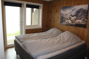 Postel nebo postele na pokoji v ubytování Skagahøgdi Apartment 19