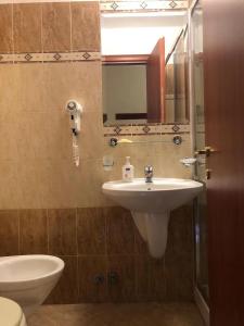 Koupelna v ubytování CAVOUR SUITES