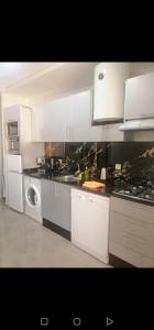 Kuchyň nebo kuchyňský kout v ubytování Comfors Appartements 2