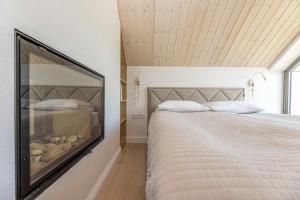 Lova arba lovos apgyvendinimo įstaigoje HolidayPlus Multiple Apartments, By Cohost