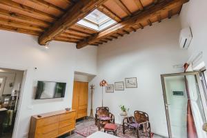 TV a/nebo společenská místnost v ubytování Agriturismo Le Fonti