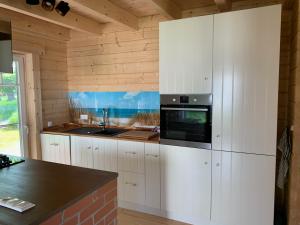 Η κουζίνα ή μικρή κουζίνα στο Lodge Klausdorf