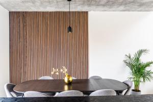 a dining room with a table and chairs at Prázdninový dům Mikulov in Mikulov