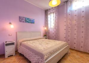 Postel nebo postele na pokoji v ubytování Locanda Del Picchio
