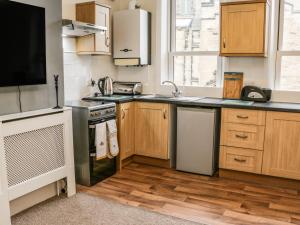 Kuchyň nebo kuchyňský kout v ubytování St Hilda's Corner House