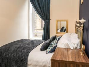 Postel nebo postele na pokoji v ubytování St Hilda's Corner House