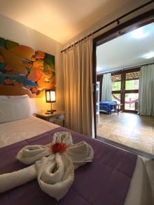 Postel nebo postele na pokoji v ubytování ThalassaGarden Hotel - Pousada