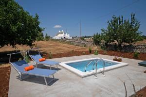 The swimming pool at or close to WePuglia - Trulli Brillina