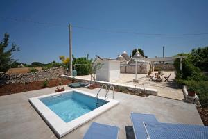 The swimming pool at or close to WePuglia - Trulli Brillina