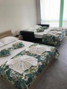 A bed or beds in a room at Villa Maria 2