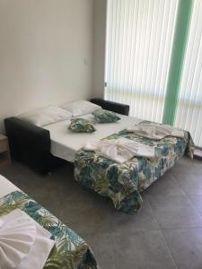A bed or beds in a room at Villa Maria 2