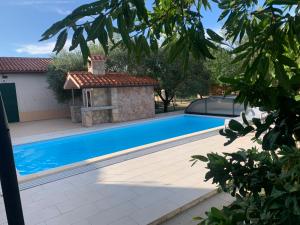 Bazén v ubytování Villa Vetta, sea, nature, pool & relax nebo v jeho okolí