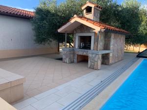 Bazén v ubytování Villa Vetta, sea, nature, pool & relax nebo v jeho okolí