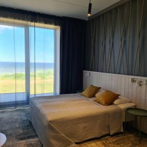 Postel nebo postele na pokoji v ubytování Tulivee Villa