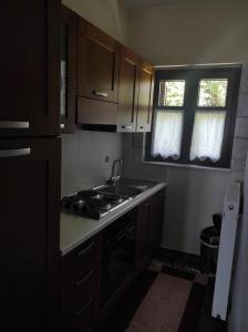 Kuchyňa alebo kuchynka v ubytovaní Meterizi Guesthouse