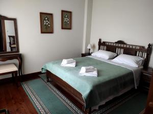 Posteľ alebo postele v izbe v ubytovaní Meterizi Guesthouse