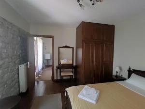 Posteľ alebo postele v izbe v ubytovaní Meterizi Guesthouse