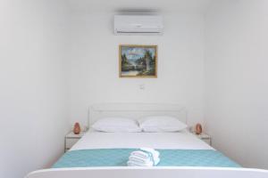 Postel nebo postele na pokoji v ubytování Apartment Maestral
