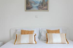 Postel nebo postele na pokoji v ubytování Apartment Maestral