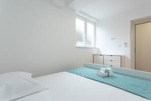 Postel nebo postele na pokoji v ubytování Apartment Maestral