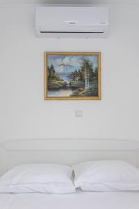 Postel nebo postele na pokoji v ubytování Apartment Maestral