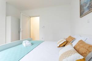Postel nebo postele na pokoji v ubytování Apartment Maestral