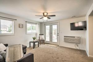 a living room with a couch and a ceiling fan at Cañon City Home 15 Mi to Royal Gorge Bridge! in Canon City
