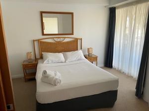 Postel nebo postele na pokoji v ubytování ALEX BEACH RESORT-317/428
