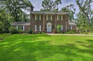 an old brick house with a large yard at Bonifay Estate with Spring-Fed Swimming Hole! in Bonifay