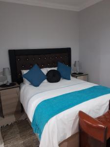 A bed or beds in a room at Vaticious