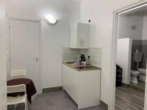 Kuchyň nebo kuchyňský kout v ubytování Albergo Lamanna Hotel digitale + 37 fotografií