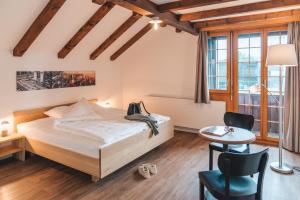 Postel nebo postele na pokoji v ubytování Hotel Müllerhof