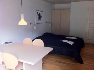 En eller flere senge i et værelse på Tollundgaard Golf Park & Apartments