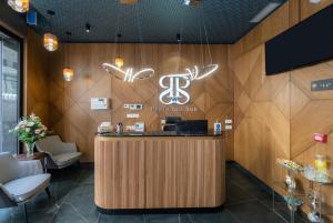 Телевизор и/или развлекательный центр в Hotel Perla del Sur